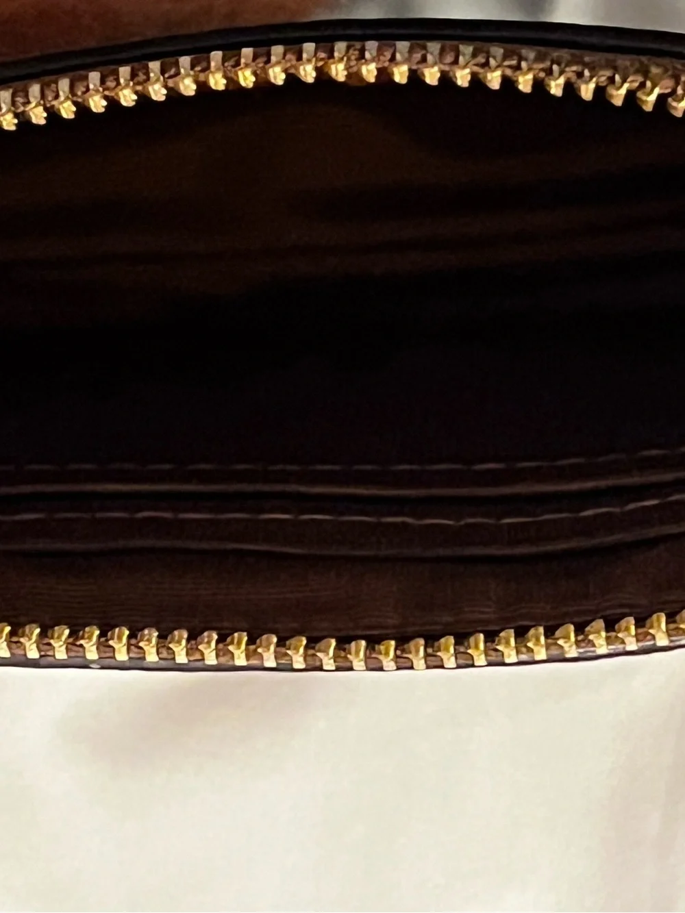COACH Brown Signature Floral Wristlet with Gold Logo